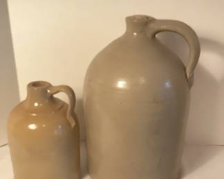 2 Light Colored Pottery Jugs