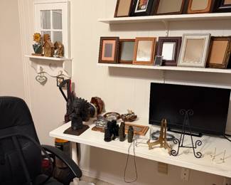 Frames, desk chair, misc. decor, binoculars