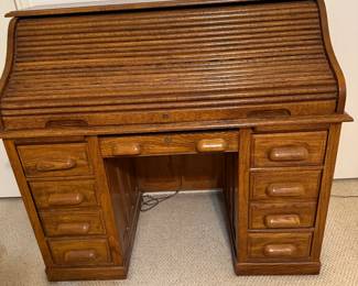 Roll top desk closed.