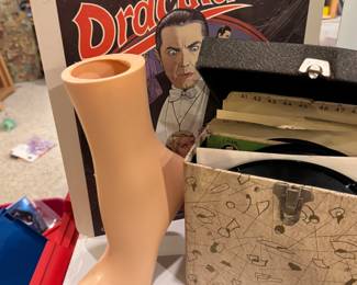 RCA Dracula CED Videodisc, 45 RPM Record Box with Vinyl, and Oddities Including Display Foot

