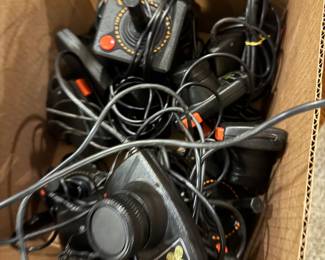 Atari controllers, accessories, cables, and power supplies,

