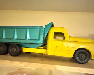 Vintage Toy Trucks and Collectibles Display
