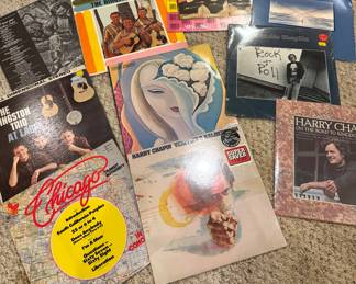 Vintage Vinyl Record Collection Featuring Eric Clapton, Chicago, Harry Chapin, Dire Straits, Devo & More

