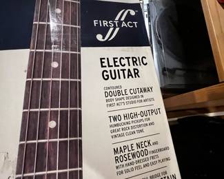 Electric guitar First Act double cutaway, too high-output, Mabel neck fingerboard