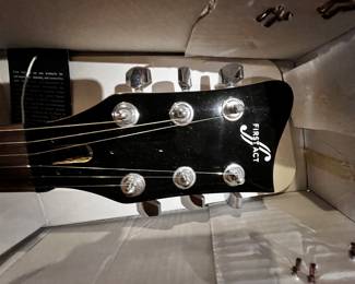 Electric guitar First Act double cutaway, too high-output, Mabel neck fingerboard