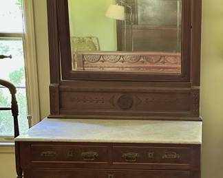Eastlake dresser with beautifully carved mirror.