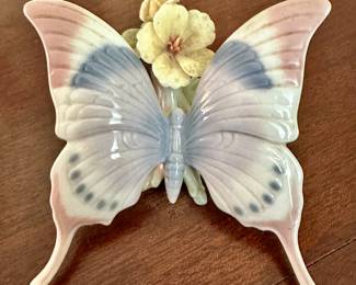 Llardo "A Moments Rest" glazed porcelain butterfly figurine.