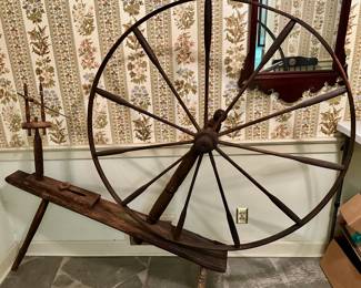 Antique spinning wheel.