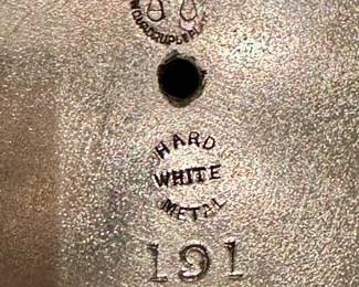 Bottom of white metal pot from Middletown Plate Co., ca 1860's - 1890's.