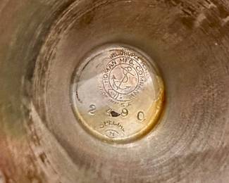 Bottom of Homan Manufacturing Company quadruple plated goblet.