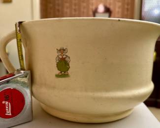 Five and one-half inch tall early Roseville Pottery Dutch creamware single handle chamber pot. No chips or crazing. Introduced 1910. Unmarked as the company did not start marking until 1924.