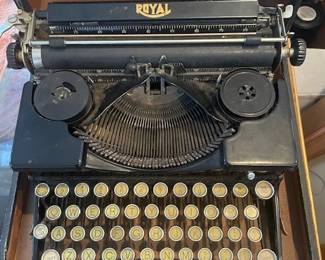 Royal typewriter with original case, 1930's. All glass-covered keys and carrier are functional.