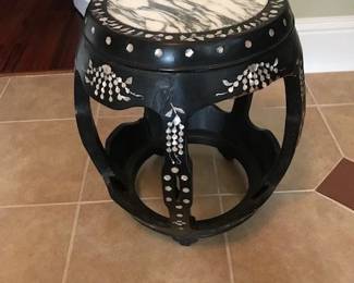 Black lacquered stand/side table with marble top and intricate Mother-of-Pearl insets throughout.