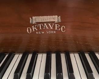 Oktavec piano in fine working condition. All keys play and the tone is beautiful. Built in 1921.