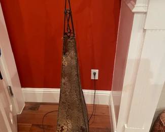Moroccan goatskin lamp, also known as Fanoos. Soft ambient lighting and delightful to look at.