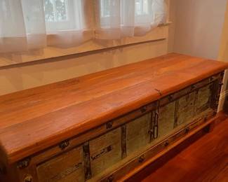 Decorative chest with ample storage space. Looks great in a bay window or against any wall. Solid build, measures 65" L x 24" H x 20" W.
