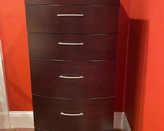 Sleek 6-drawer dresser with blonde wood interiors. Measures 55"H x 24" W x 22" D