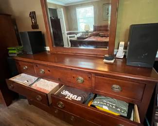 Bedroom dresser full of tee shirts
