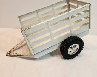 Tonka Metal Toy White Utility Trailer https://www.auctionninja.com/stress-free-estate-services-llc/sales/details/collectors-cache-auction-coins-vintage-toys-jewelry-collectibles-ephemera-silver-and-more-no-reserves-shipping-available-or-alton-nh-pickup-36.html?an=pptvtd