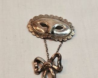 Sterling Mask Brooch https://www.auctionninja.com/stress-free-estate-services-llc/sales/details/collectors-cache-auction-coins-vintage-toys-jewelry-collectibles-ephemera-silver-and-more-no-reserves-shipping-available-or-alton-nh-pickup-36.html?an=pptvtd
