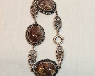 Small Sterling And Massive Agate Bracelet  https://www.auctionninja.com/stress-free-estate-services-llc/sales/details/collectors-cache-auction-coins-vintage-toys-jewelry-collectibles-ephemera-silver-and-more-no-reserves-shipping-available-or-alton-nh-pickup-36.html?an=pptvtd