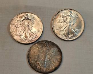 Three 1986 Liberty Silver Dollars https://www.auctionninja.com/stress-free-estate-services-llc/sales/details/collectors-cache-auction-coins-vintage-toys-jewelry-collectibles-ephemera-silver-and-more-no-reserves-shipping-available-or-alton-nh-pickup-36.html?an=pptvtd