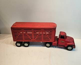 Tonka Metal Toy Trucks Livestock Hauler Red  https://www.auctionninja.com/stress-free-estate-services-llc/sales/details/collectors-cache-auction-coins-vintage-toys-jewelry-collectibles-ephemera-silver-and-more-no-reserves-shipping-available-or-alton-nh-pickup-36.html?an=pptvtd