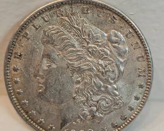 1900 Morgan Silver Dollar https://www.auctionninja.com/stress-free-estate-services-llc/sales/details/collectors-cache-auction-coins-vintage-toys-jewelry-collectibles-ephemera-silver-and-more-no-reserves-shipping-available-or-alton-nh-pickup-36.html?an=pptvtd