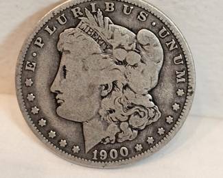 1900 O Morgan Silver Dollar https://www.auctionninja.com/stress-free-estate-services-llc/sales/details/collectors-cache-auction-coins-vintage-toys-jewelry-collectibles-ephemera-silver-and-more-no-reserves-shipping-available-or-alton-nh-pickup-36.html?an=pptvtd