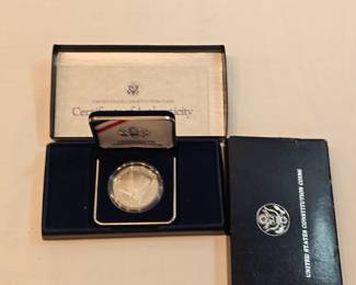 1987 US Constitution Silver Dollar With Case And COA https://www.auctionninja.com/stress-free-estate-services-llc/sales/details/collectors-cache-auction-coins-vintage-toys-jewelry-collectibles-ephemera-silver-and-more-no-reserves-shipping-available-or-alton-nh-pickup-36.html?an=pptvtd