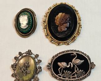 4 Brooches Lot https://www.auctionninja.com/stress-free-estate-services-llc/sales/details/collectors-cache-auction-coins-vintage-toys-jewelry-collectibles-ephemera-silver-and-more-no-reserves-shipping-available-or-alton-nh-pickup-36.html?an=pptvtd