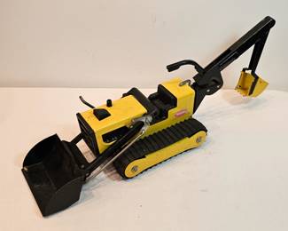 Tonka Metal Toy Trucks Backhoe  https://www.auctionninja.com/stress-free-estate-services-llc/sales/details/collectors-cache-auction-coins-vintage-toys-jewelry-collectibles-ephemera-silver-and-more-no-reserves-shipping-available-or-alton-nh-pickup-36.html?an=pptvtd