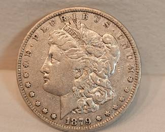 1879 Morgan Silver Dollar https://www.auctionninja.com/stress-free-estate-services-llc/sales/details/collectors-cache-auction-coins-vintage-toys-jewelry-collectibles-ephemera-silver-and-more-no-reserves-shipping-available-or-alton-nh-pickup-36.html?an=pptvtd