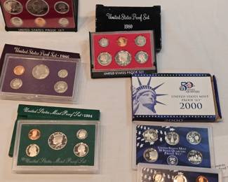 4 Assorted Proof Sets https://www.auctionninja.com/stress-free-estate-services-llc/sales/details/collectors-cache-auction-coins-vintage-toys-jewelry-collectibles-ephemera-silver-and-more-no-reserves-shipping-available-or-alton-nh-pickup-36.html?an=pptvtd