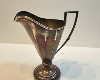 Sterling Silver Cream Pitcher https://www.auctionninja.com/stress-free-estate-services-llc/sales/details/collectors-cache-auction-coins-vintage-toys-jewelry-collectibles-ephemera-silver-and-more-no-reserves-shipping-available-or-alton-nh-pickup-36.html?an=pptvtd