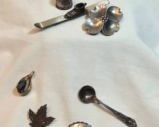 Sterling Brooches And Pendant https://www.auctionninja.com/stress-free-estate-services-llc/sales/details/collectors-cache-auction-coins-vintage-toys-jewelry-collectibles-ephemera-silver-and-more-no-reserves-shipping-available-or-alton-nh-pickup-36.html?an=pptvtd