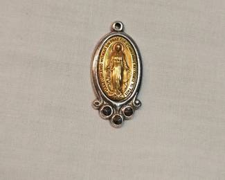 Sterling Silver And 10k Gold Religious Medal https://www.auctionninja.com/stress-free-estate-services-llc/sales/details/collectors-cache-auction-coins-vintage-toys-jewelry-collectibles-ephemera-silver-and-more-no-reserves-shipping-available-or-alton-nh-pickup-36.html?an=pptvtd