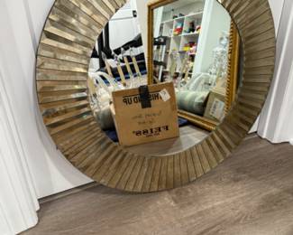 Gilt framed round mirror