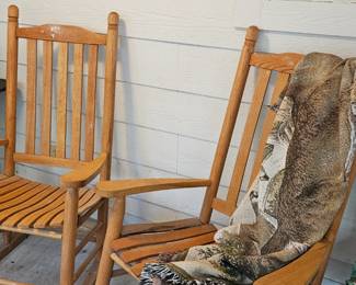 Two large wooden rockers