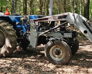 Long Tractor 2510 with shredder