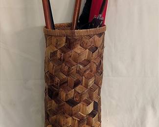 Umbrellas, Canes, And Basket