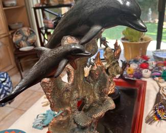 Bronze dolphin sculpture