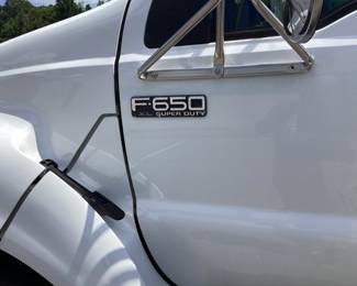 2002 Ford F-650 XL VIN: 3fdnf65852ma28779 Miles: 82,446 Engine: 5.9L CUMMINS DIESEL Color: WHITE 2002 FORD SUPER DUTY F-650 REGULAR CAB XL FLATBED w 5.9L CUMMINS DIESEL ENGINE, 24 VALVE, GVWR 26,000lbs, STRAIGHT FRAME, TIRES ARE 90% w TREAD, AIR CONDITIONER NEEDS CHARGING, FUEL GAUGE NEEDS REPAIR