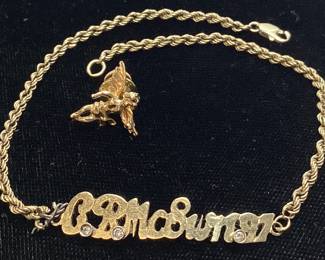 14KT YELLOW GOLD ROPE CHAIN BRACELET & CHERUB PIN 7.9g TOTAL WEIGHT, CLASP NEEDS REPAIR, CHAIN BROKEN ON ONE SIDE-CONNECTED BY METAL
