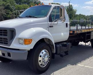 2002 Ford F-650 XL VIN: 3fdnf65852ma28779 Miles: 82,446 Engine: 5.9L CUMMINS DIESEL Color: WHITE 2002 FORD SUPER DUTY F-650 REGULAR CAB XL FLATBED w 5.9L CUMMINS DIESEL ENGINE, 24 VALVE, GVWR 26,000lbs, STRAIGHT FRAME, TIRES ARE 90% w TREAD, AIR CONDITIONER NEEDS CHARGING, FUEL GAUGE NEEDS REPAIR