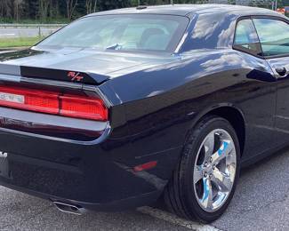 2014 Dodge CHALLENGER R/T VIN: 2c3cdybt1eh115673 Miles: 125,152 Engine: 5.7 LITER Color: BLACK 2014 DODGE RT CHALLENGER HEMI 5.7 LITER V8 COUPE, 6 SPEED MANUAL, 20in RIMS, CAR IS IN GOOD RUNNING CONDITION, A/C COLD, TIRES GOOD CONDITION, LEATHER INTERIOR, REAR SPOILER, RACING STRIPES, LEFT & RIGHT HOOD SCOOPS