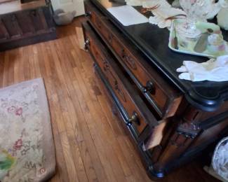 this dresser has a hidden drawer