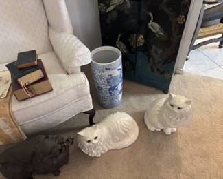 2 matching wing back chairs, umbrella holder, 2 large ceramic cats