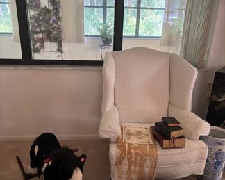 Child's horse rocker it moves it head, wags the tail and make horse sounds.  Winged chair in excellent condition