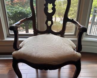 Carved French arm chair
